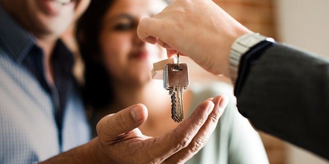 Couple gets keys to their new home